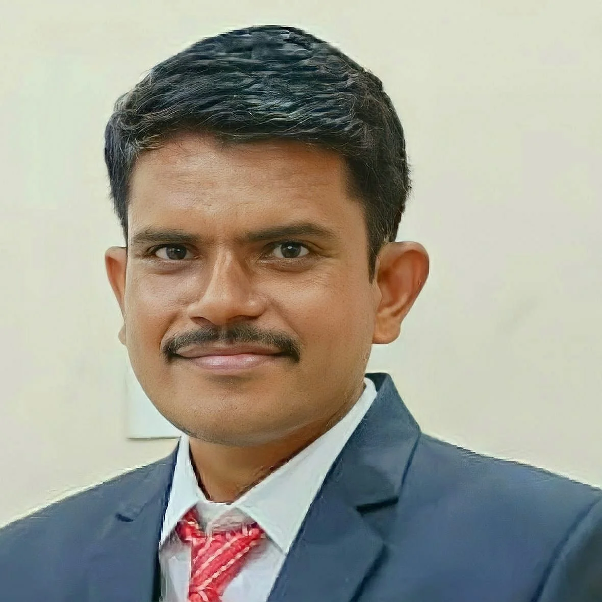 Dr. Mangesh G. Acharya